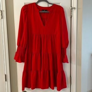 Pomander Place by Tuckernuck Tiered Dress red dress, with smocked sleeves.